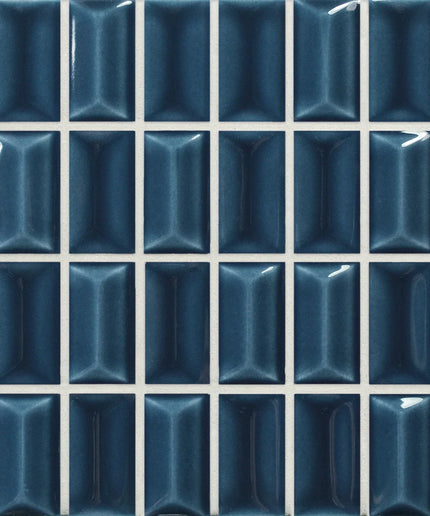 diamond-sapphir-gloss Blue ceramic tiles arranged in a grid pattern