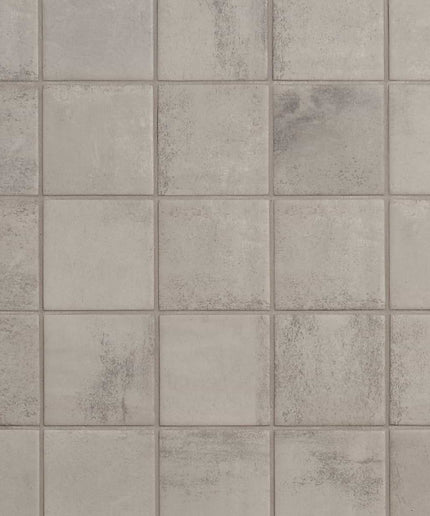 Pattern of gray tiles with a subtle texture