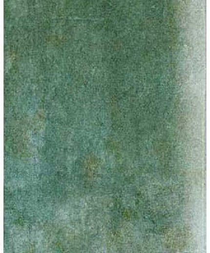 Rectangular green rug with a textured pattern