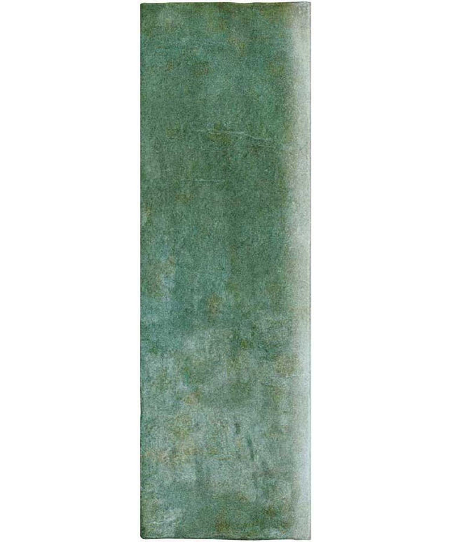 Rectangular green rug with a textured pattern