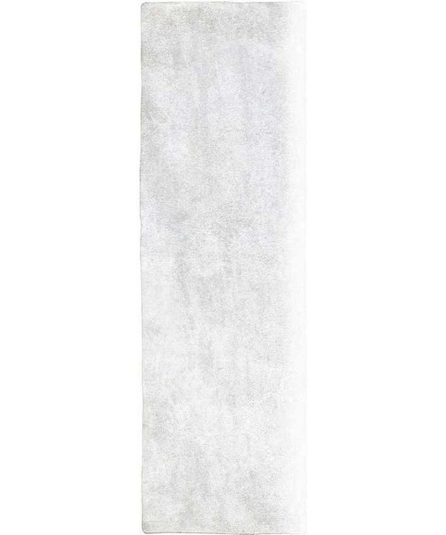 Rectangular white rug with a subtle pattern on a plain background
