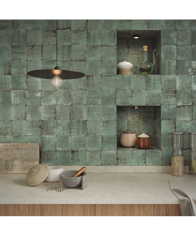 Green tiled wall with shelves and kitchen items in a modern kitchen setting