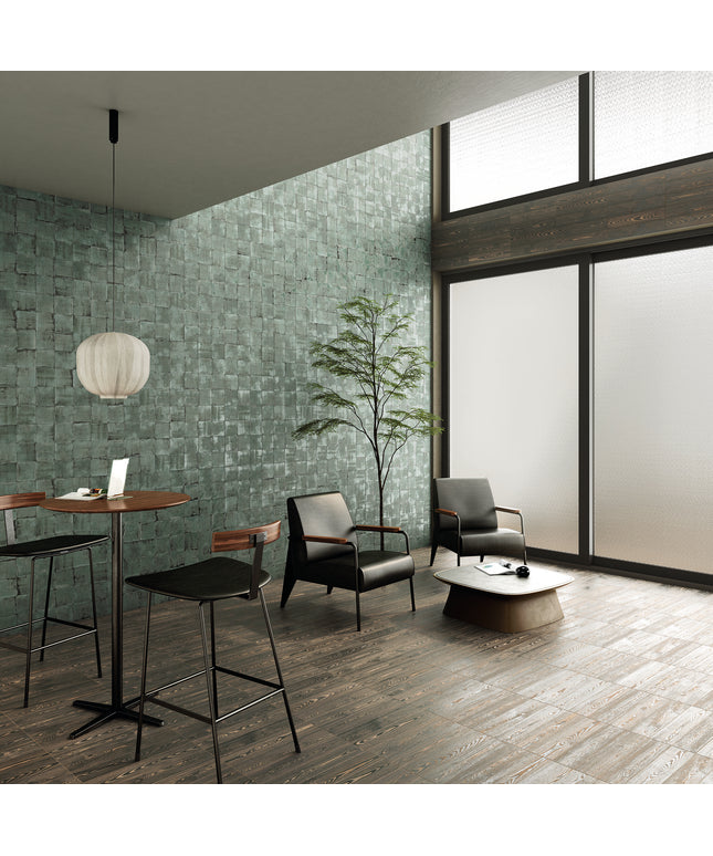 Modern interior with green textured wall, wooden floor, and furniture.