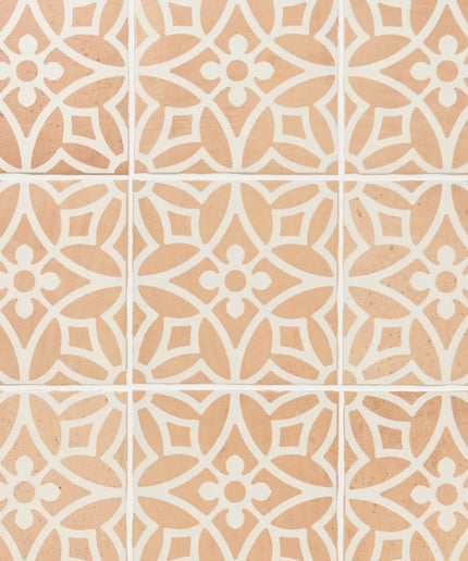 Terracotta 9x9 wall tiles with white floral geometric pattern, ideal for kitchen or bathroom.