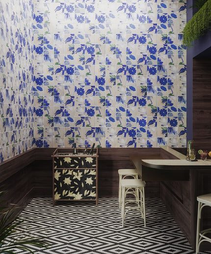 Room interior with floral wallpaper, wooden furniture, and geometric floor pattern.