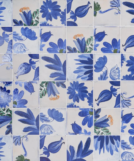 Pattern of blue floral tiles on a white background