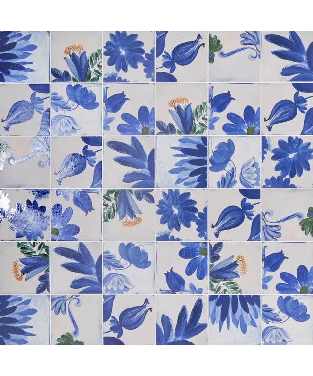 Pattern of blue floral tiles on a white background