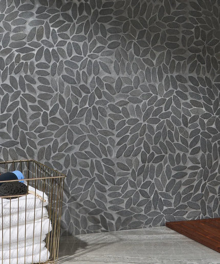 Black flower mosaic lava tiles used on a modern bathroom wall