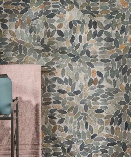 flower sumatra natural stone mosaic tiles on bathroom wall with towel and bottles