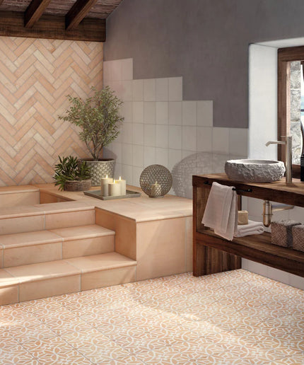Modern bathroom with wooden bench, towels, and decorative elements.