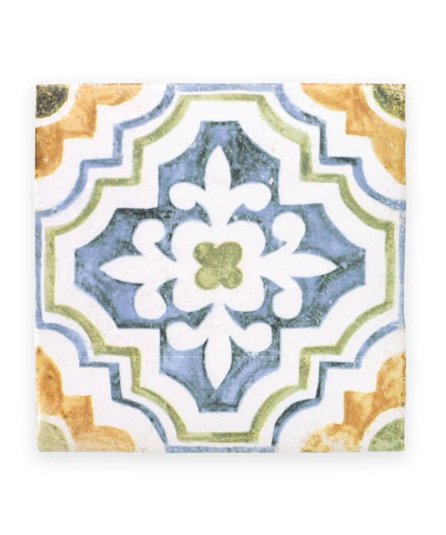 Decorative tile with floral pattern on a white background