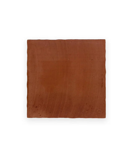 Square brown leather patch on a white background