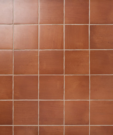 Pattern of brown tiles with a grid layout