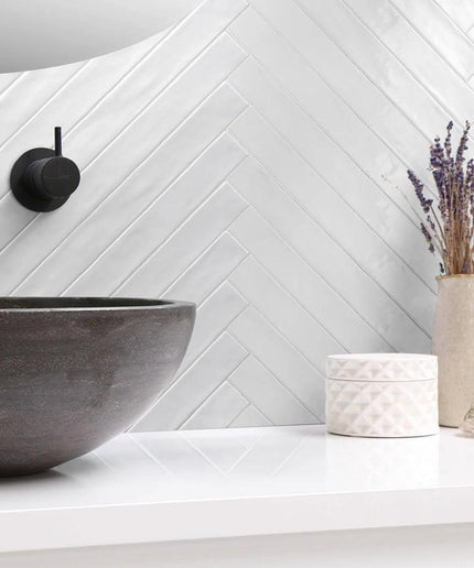 ghiaccio-glossy-ceramic-2x10-subway-tile-herringbone