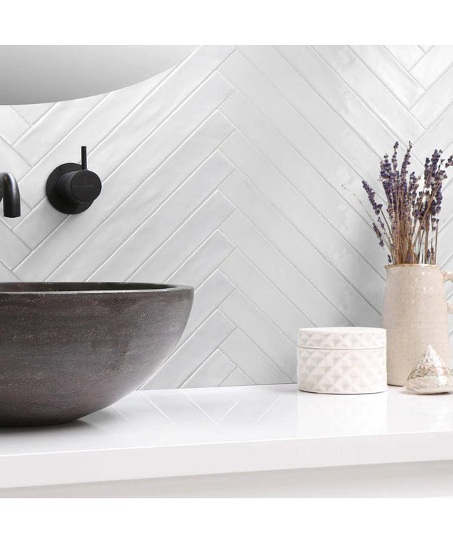 ghiaccio-glossy-ceramic-2x10-subway-tile-herringbone