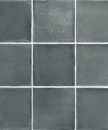 Grid of dark gray tiles with visible grout lines