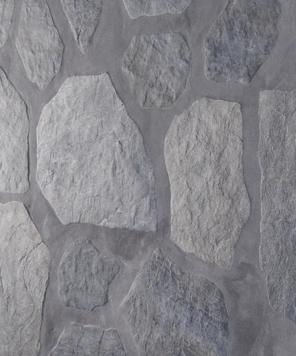 Close-up of a stone wall with gray stones