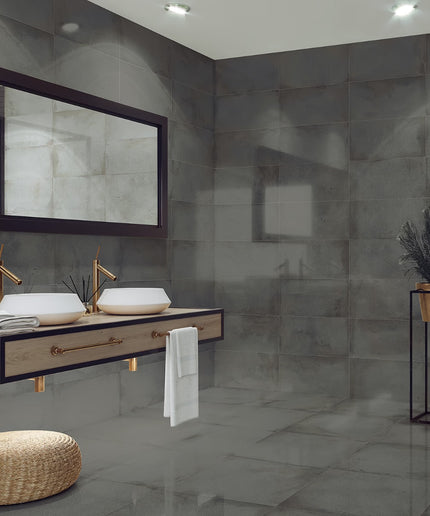 Modern bathroom with gray tiles, a wooden vanity, and decorative elements.