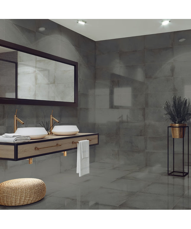 Modern bathroom with gray tiles, a wooden vanity, and decorative elements.