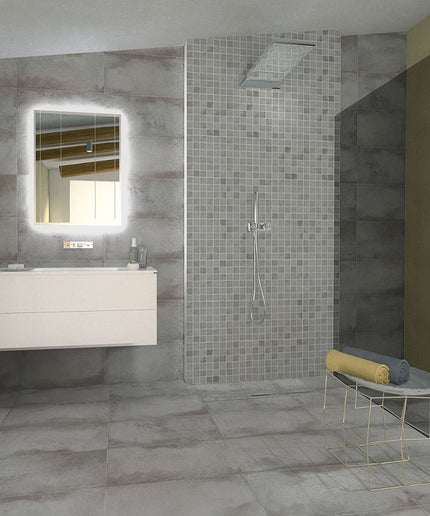 Modern bathroom with gray tiled walls, a white vanity, and a shower area.