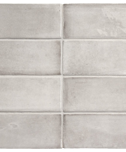Gray concrete tiles arranged in a grid pattern on a white background
