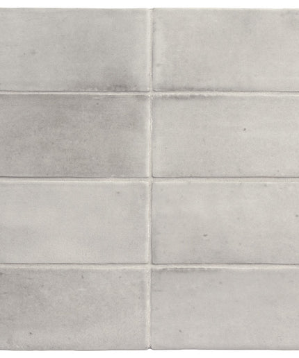 Gray rectangular tiles arranged in a grid pattern