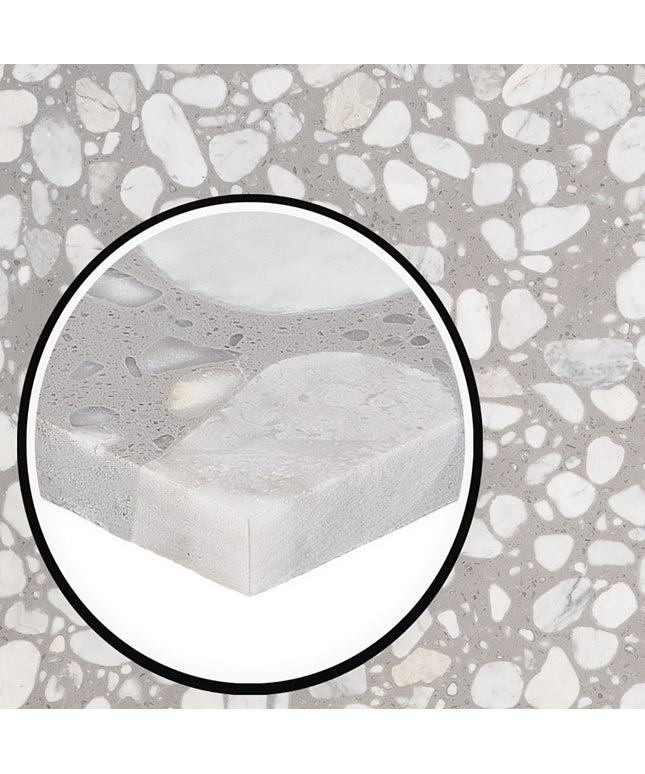 Close-up of a concrete block with a textured surface, surrounded by a circular inset.