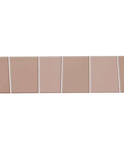 Six rectangular ceramic tiles in a warm taupe-beige color, arranged in a horizontal row with thin grout lines on a solid white background.