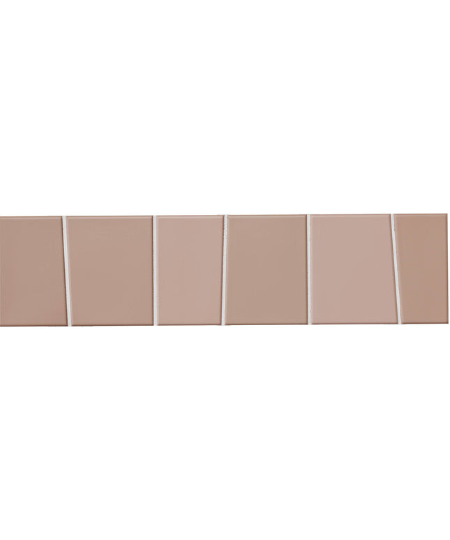 Six rectangular ceramic tiles in a warm taupe-beige color, arranged in a horizontal row with thin grout lines on a solid white background.