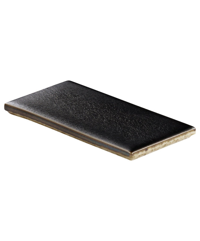 Black rectangular ceramic plate on a white background