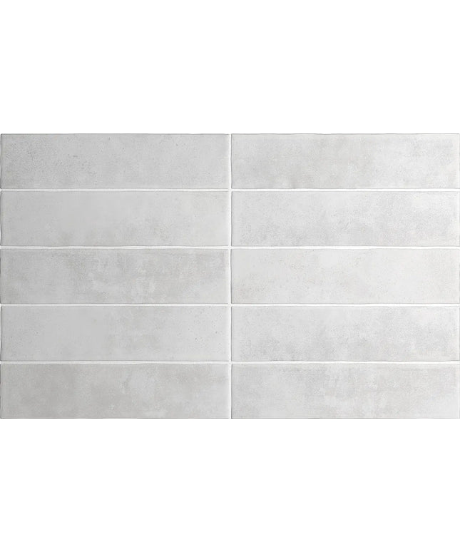 Gray tiles with a subtle pattern on a white background
