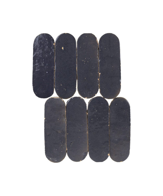 Indigo mist 2x6 oval mosaic tiles with a matte blue finish for backsplash or shower walls