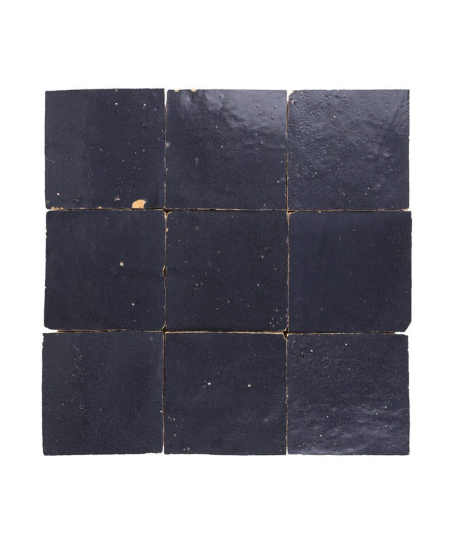 Indigo blue 4x4 zellige tiles with handcrafted, glossy finish and subtle surface texture