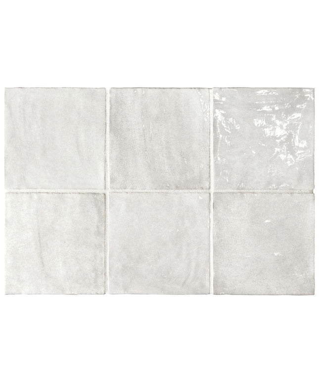 Set of six square tiles with a light gray marble pattern on a white background