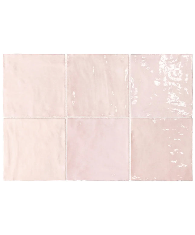 Set of six pink ceramic tiles with a subtle pattern