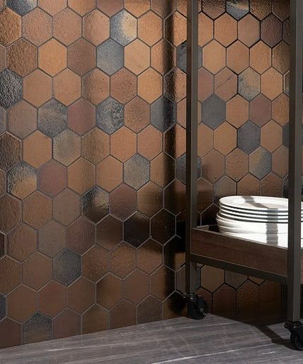 Hexagonal tiles with a metallic finish in a bathroom setting