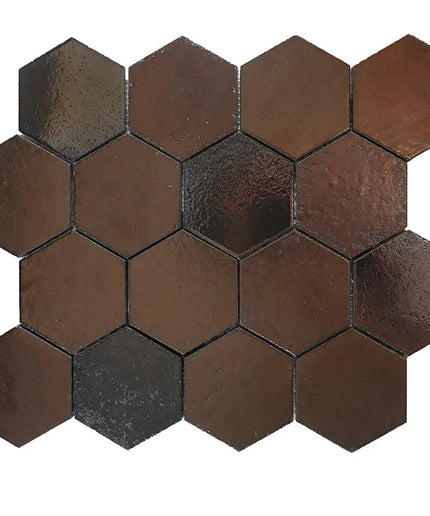 Hexagonal tiles with a metallic finish on a white background