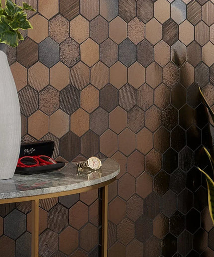 Hexagonal tile pattern on a wall with a table and decorative items.