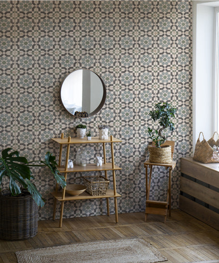 Decorative wall tiles with geometric pattern in a modern living space with plants and wood shelves