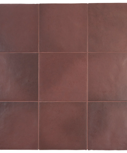 A 3x3 grid of square terracotta brown tiles with a matte, slightly textured finish and thin grout lines.