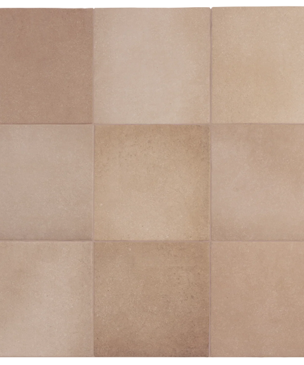 Nine square beige and light brown tiles arranged in a 3x3 grid, showing a textured stone or ceramic finish.