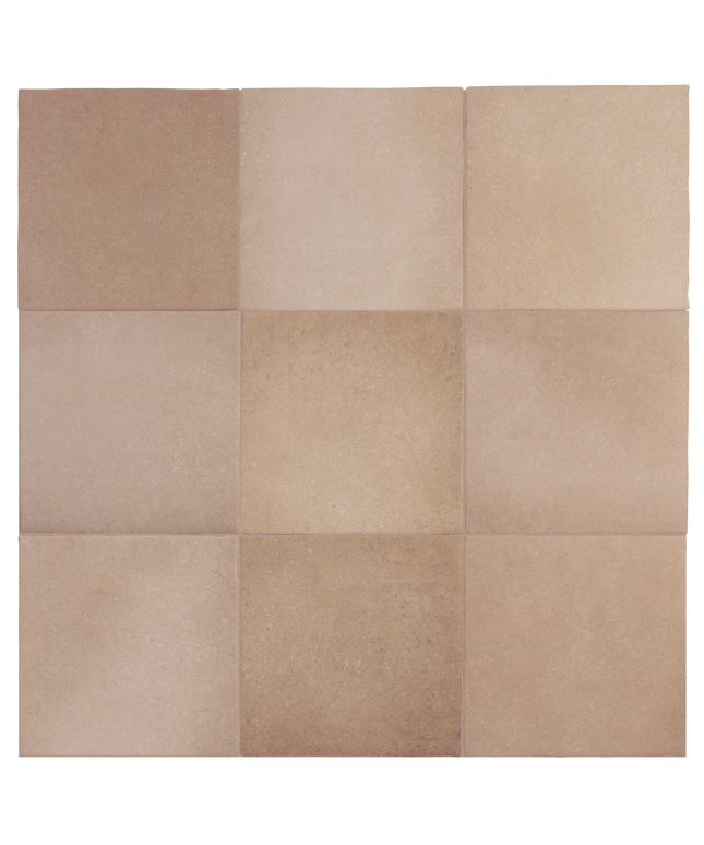 Nine square beige and light brown tiles arranged in a 3x3 grid, showing a textured stone or ceramic finish.