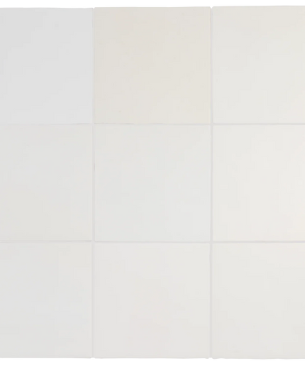 A 3x3 grid of square panels in very light neutral tones, ranging from pale blue-gray to off-white and cream, with thin gray dividing lines.