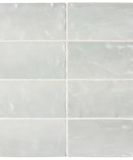 Set of six white rectangular tiles on a white background