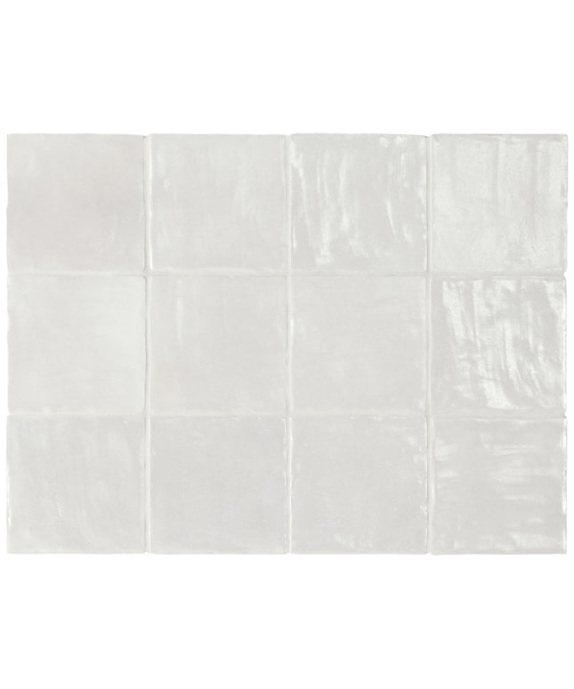 White ceramic tiles arranged in a grid pattern on a white background