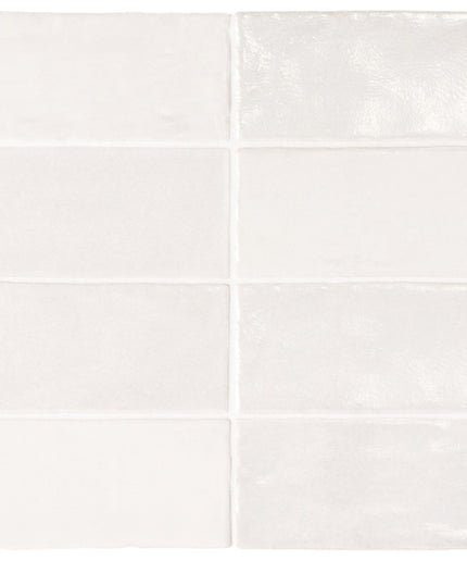 Four white tiles arranged in a grid pattern on a white background