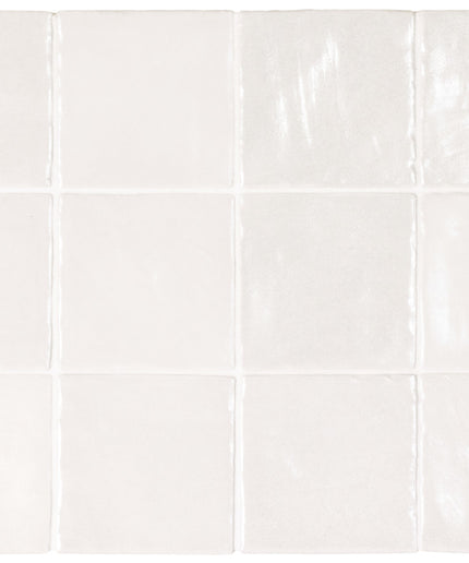 White ceramic tiles arranged in a grid pattern