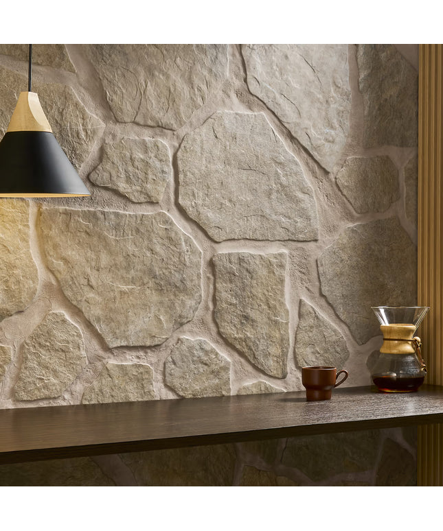 Stone wall with a coffee cup and Chemex on a wooden surface