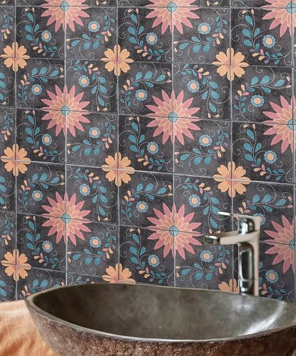 Decorative floral wall tiles with pink, yellow, and blue patterns in a bathroom setting