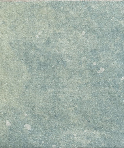 Seafoam green ceramic tile with subtle textured pattern, ideal for bathroom or kitchen backsplash.